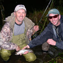 Jesse and craig with a shiny trout