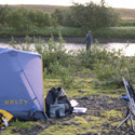camp with river in background